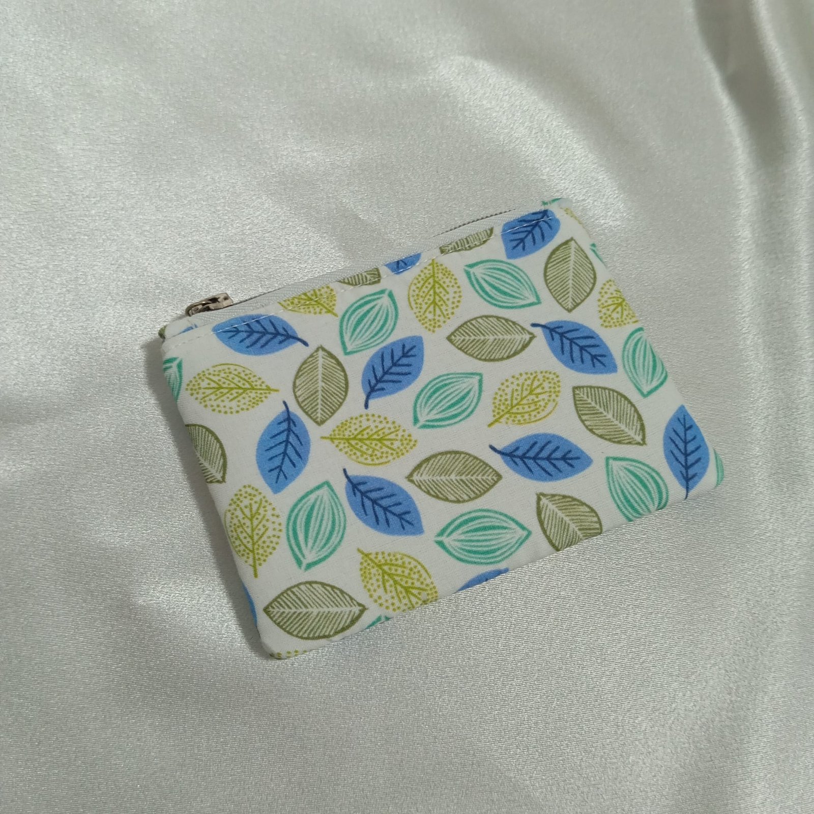 Monedero Hojas del Viento, Básico